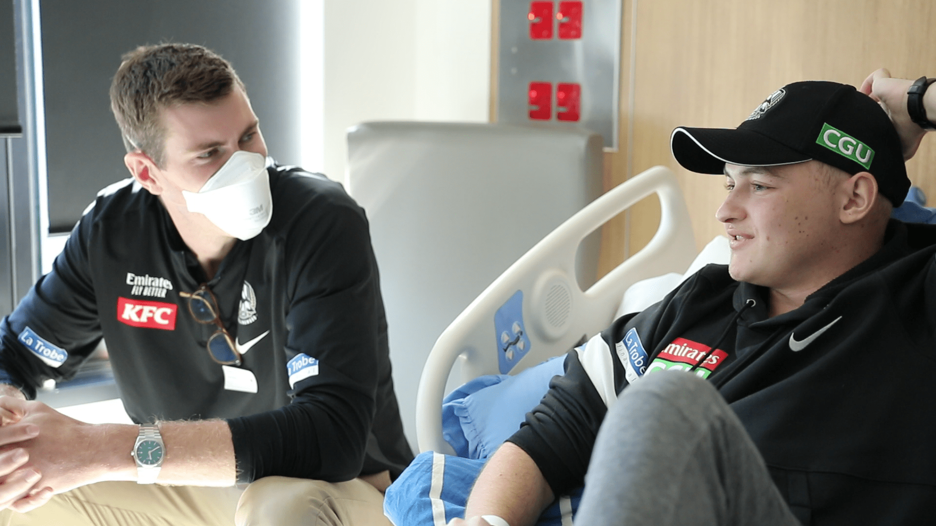 Mason Cox talking with a Peter Mac patient