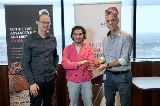 CAHM Manager Paul McMillan, winner Andrea Usseglio Gaudi and Professor Ricky Johnstone, Executive Director of Cancer Research